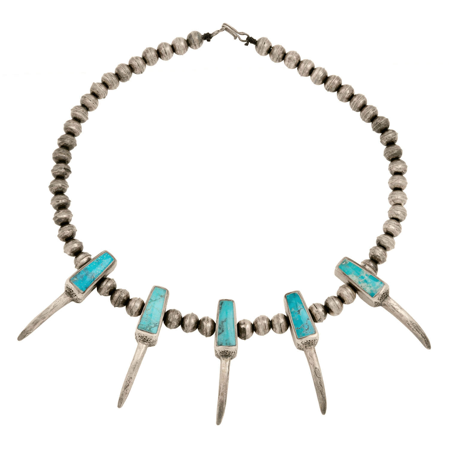 Native American buying silver and turquoise necklace